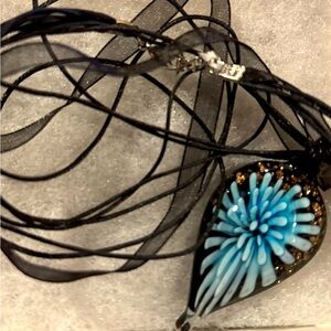Glass blue and gold flower necklace